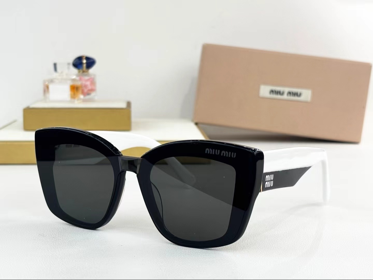 MIU MIU - SMU 08U - 52 21 140