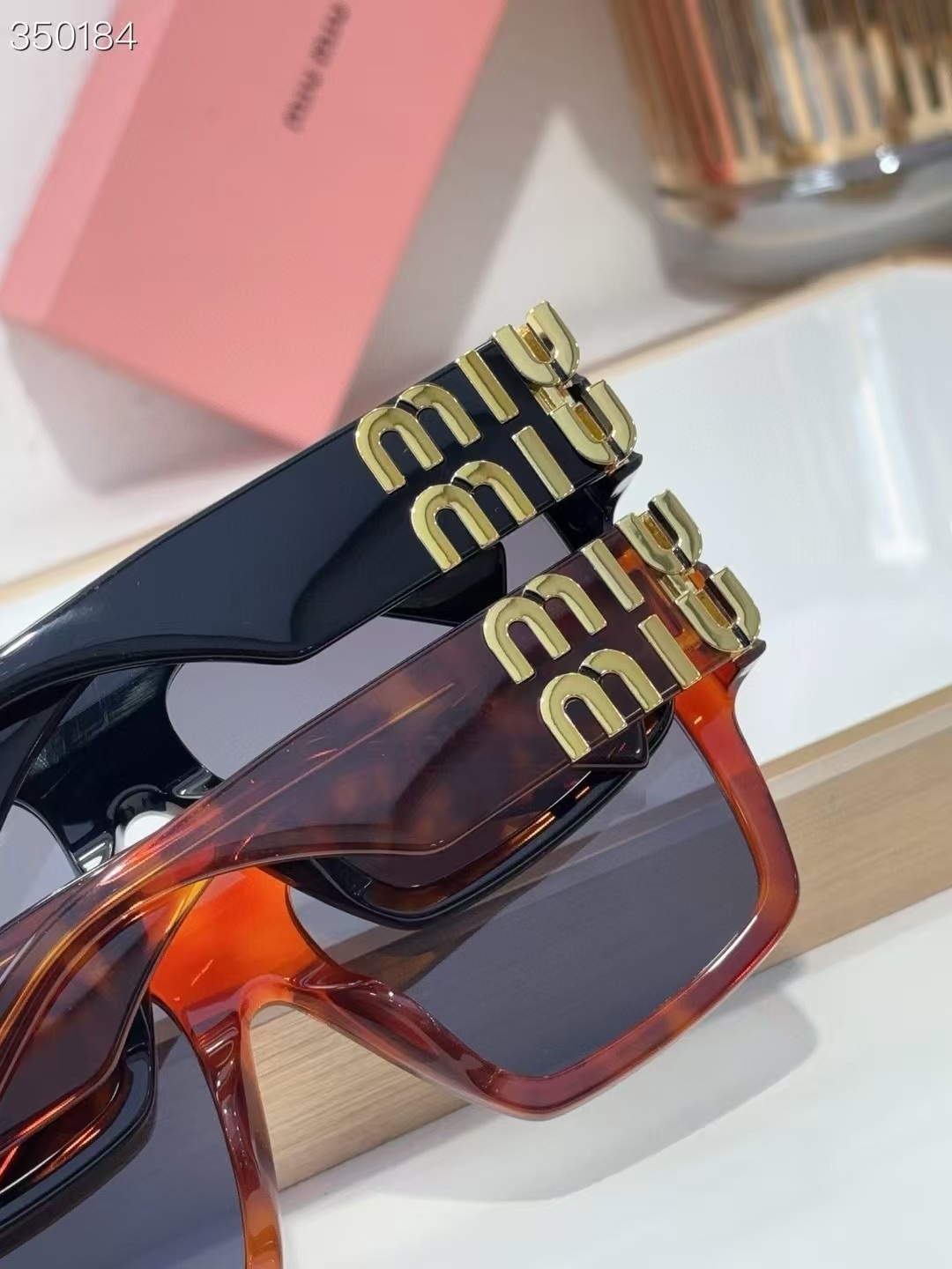 MIU MIU - SMU 10W - 57 20 140