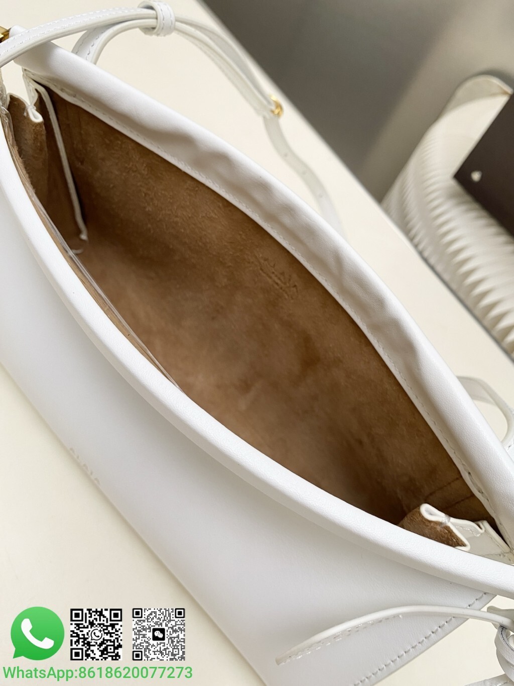 Alaia Small Le Click East West Leather Shoulder Bag