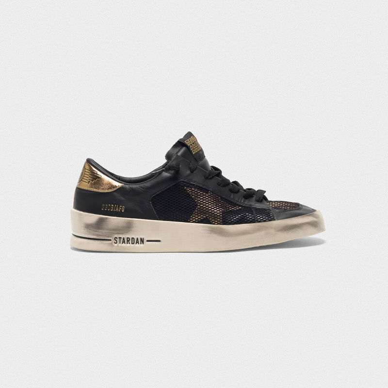 golden goose Stardan sneakers in black and gold leather with mesh inserts(34C5)