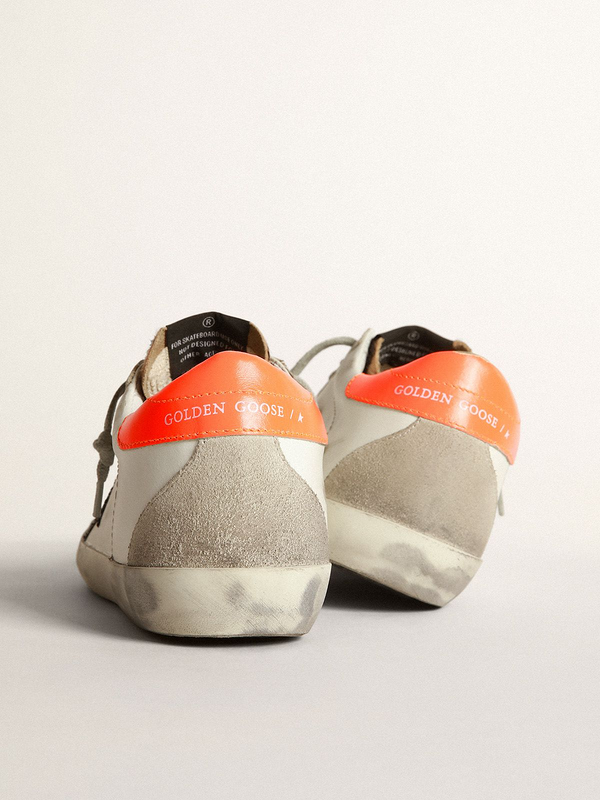 golden goose Super-Star sneakers with leopard-print insert, glittery star and orange heel tab